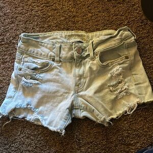 American Eagle Stretch Midi Ripped Denim Shorts in US size 0